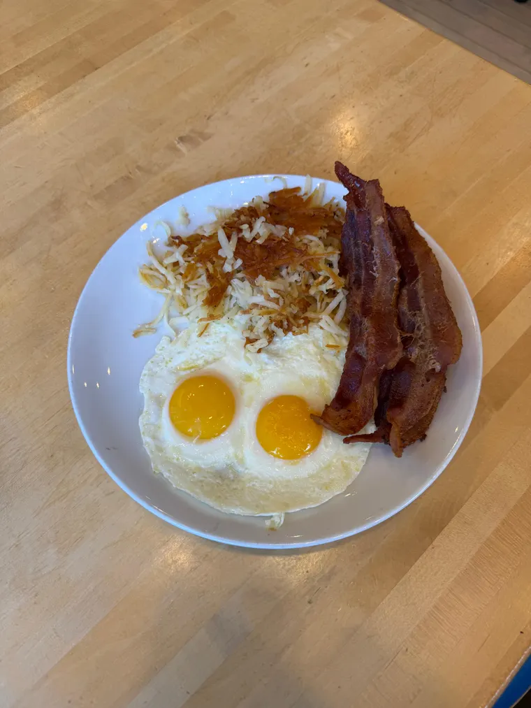 Two Eggs w/ bacon at Yolk City Way Indianapolis